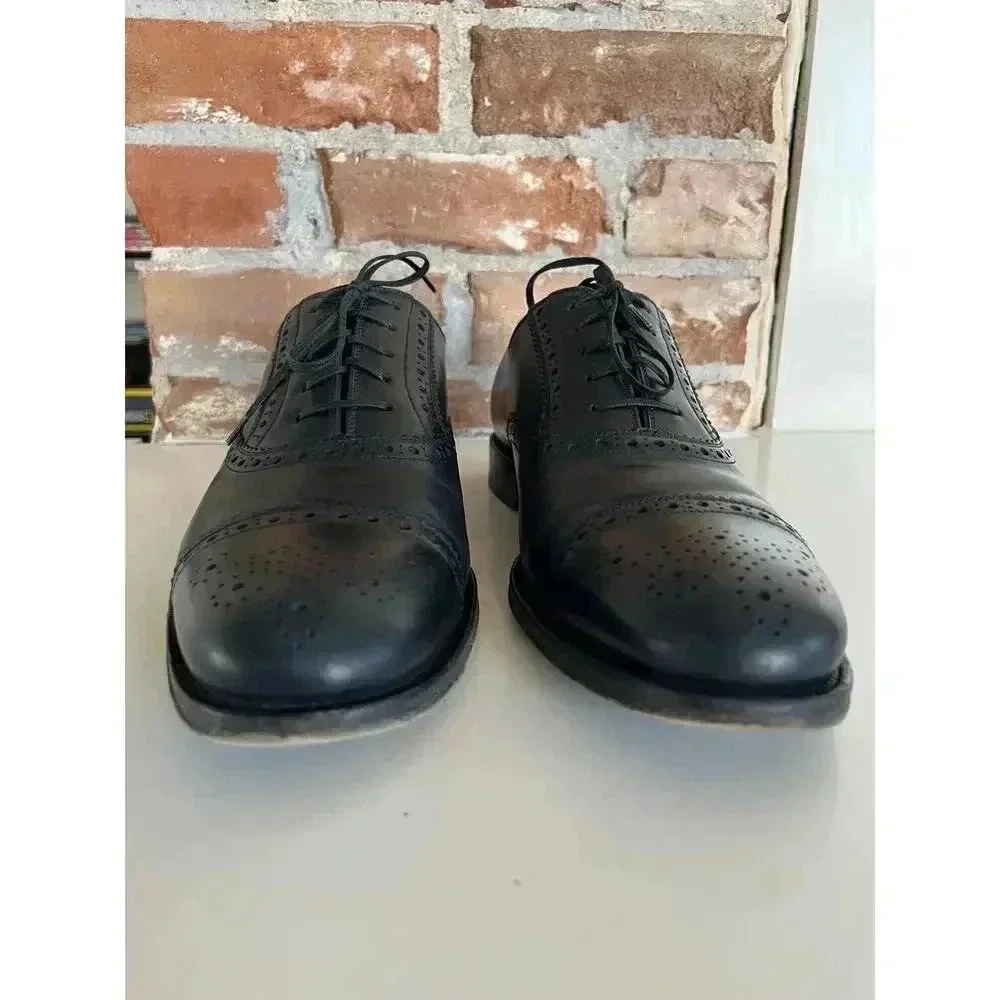 Salvatore Ferragamo Black Leather Wingtip Oxfords